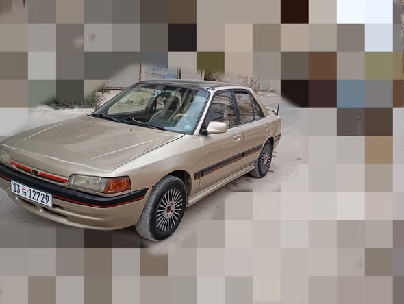 مازدا 323 1993 - صورة 2