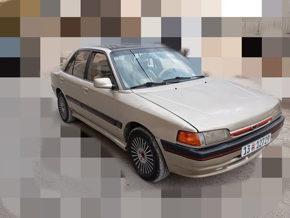 مازدا 323 1993 - صورة 3