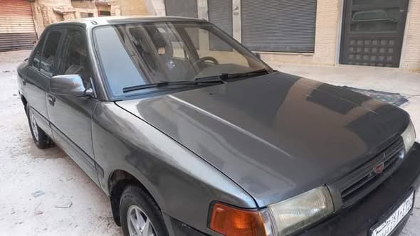 مازدا ٣٢٣ 1993 - صورة 1