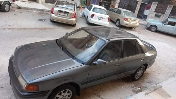 مازدا ٣٢٣ 1993 - صورة 2