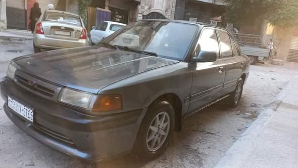 مازدا ٣٢٣ 1993 - صورة 4