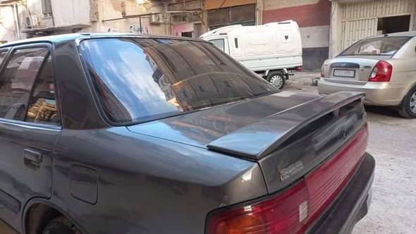 مازدا ٣٢٣ 1993 - صورة 5