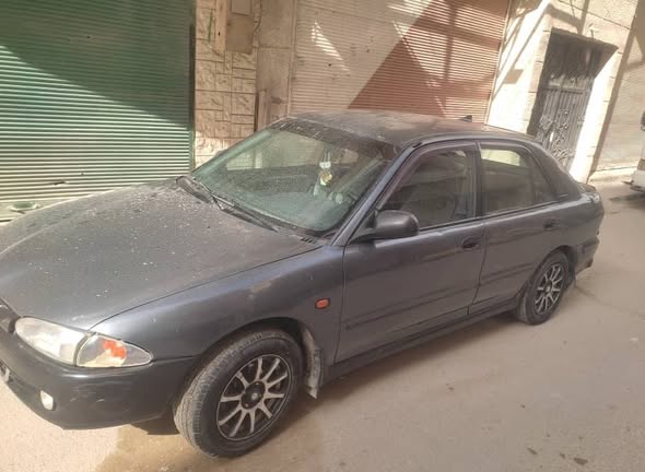 بروتون ويرا 2001 - صورة 1