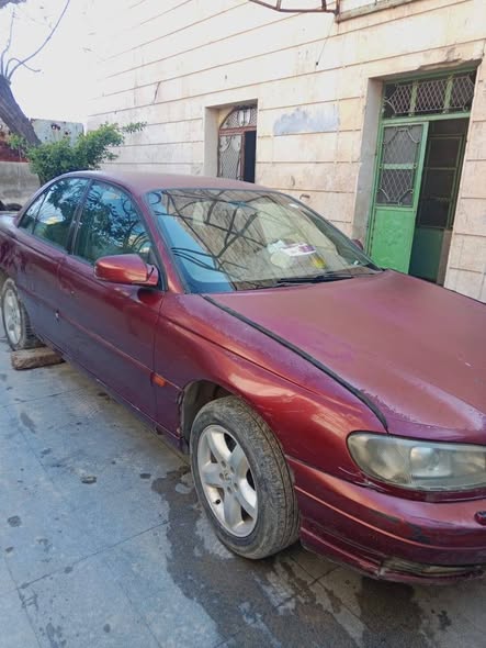 ابل امغا30 2000 - صورة 5