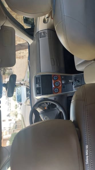 تويوتا كورولا قصة الكامري 2010 - صورة 4