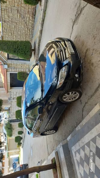 تويوتا كورولا قصة الكامري 2010 - صورة 5