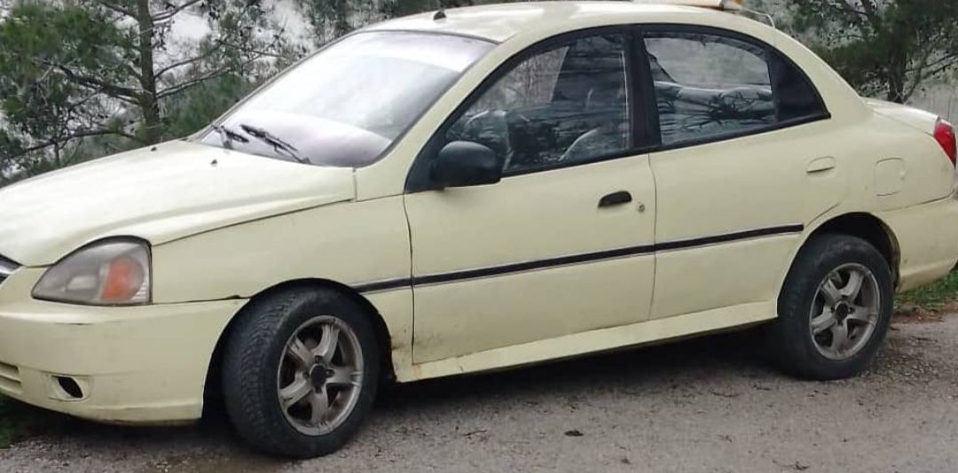 كيا ريو فراشة 2003