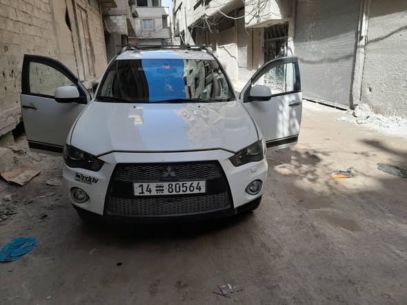 ميتسوبيشي اوتلاندر 2012 - صورة 1