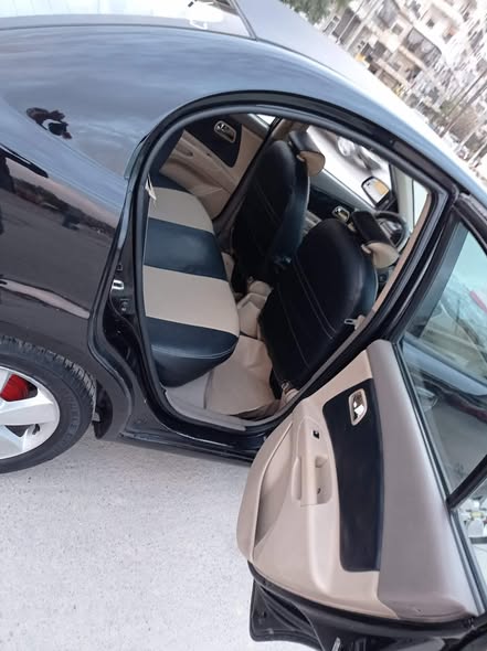 كيا ريو 2009 - صورة 5