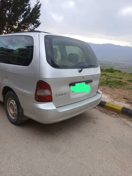 كيا كرنفال 2002 - صورة 1