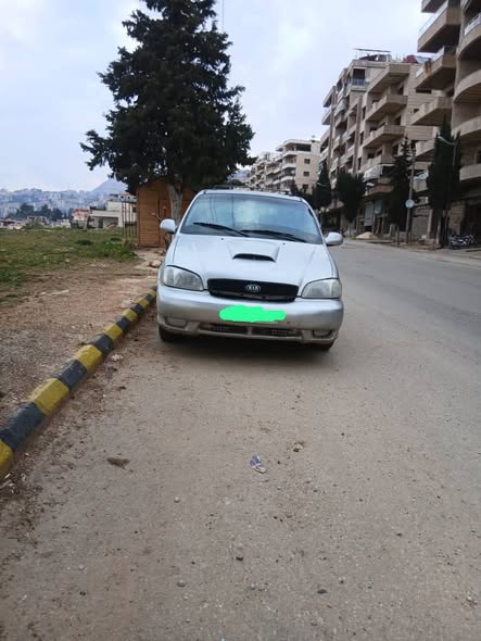 كيا كرنفال 2002 - صورة 4