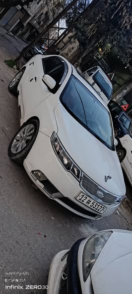 كيا فورتي 2010 - صورة 1