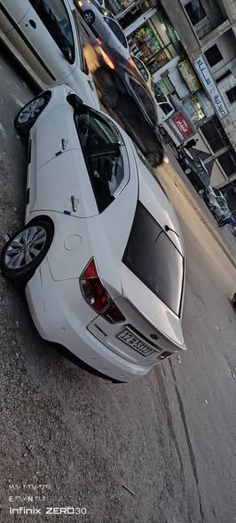 كيا فورتي 2010 - صورة 5