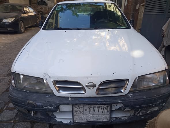 نيسان بريميرا.GXE 1999 - صورة 1