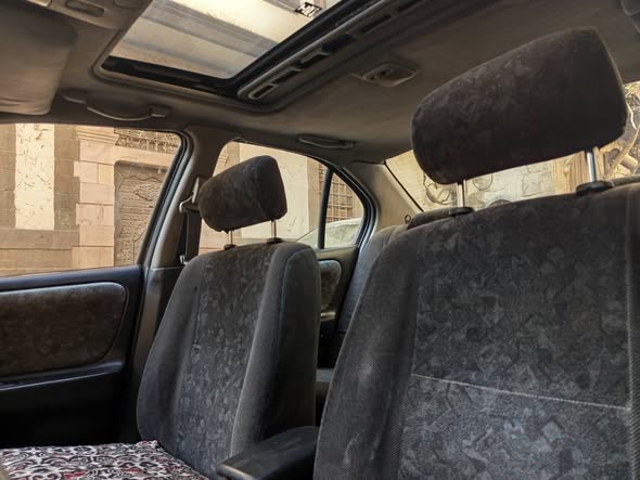 نيسان بريميرا.GXE 1999 - صورة 3