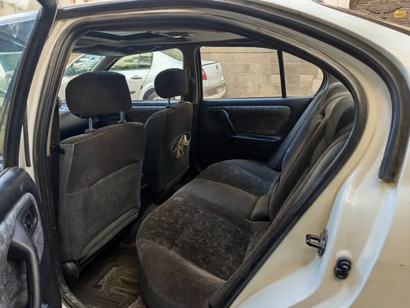 نيسان بريميرا.GXE 1999 - صورة 5