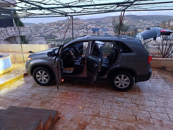 كيا سورنتو 2010 - صورة 3