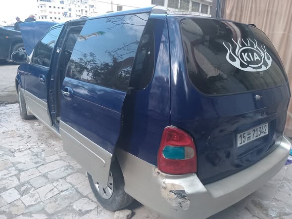 كيا كرنفال 2002 - صورة 4