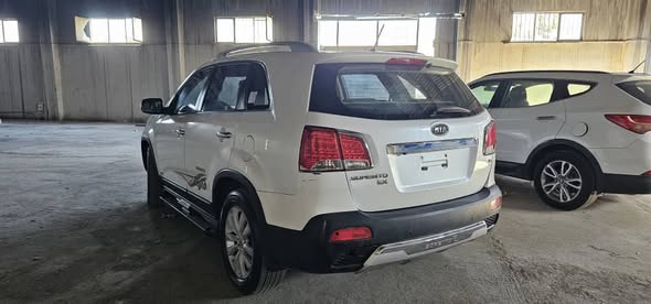 كيا سورنتو 2013 - صورة 3