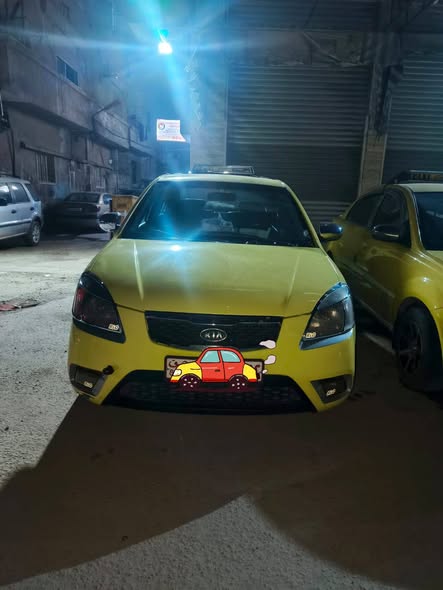 كيا ريو 2011 - صورة 1