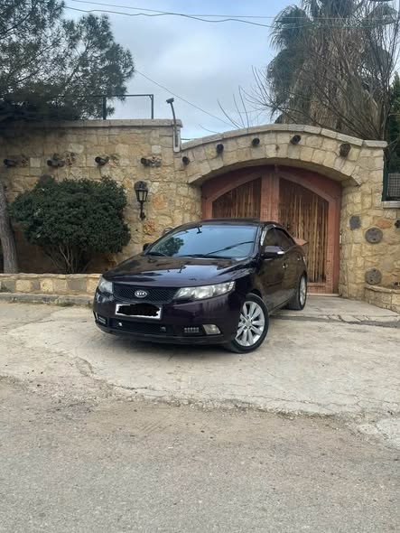 كيا فورتي 2011 - صورة 2