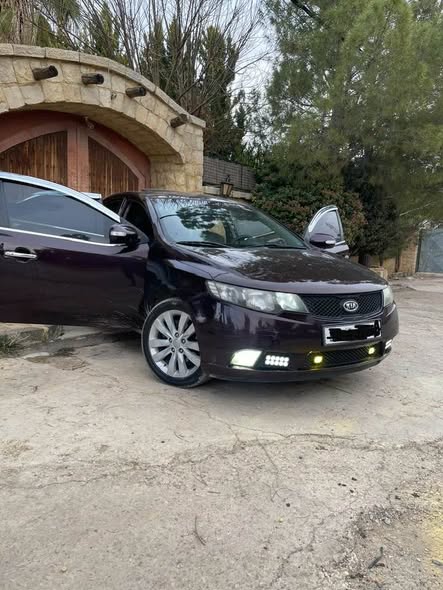 كيا فورتي 2011 - صورة 4