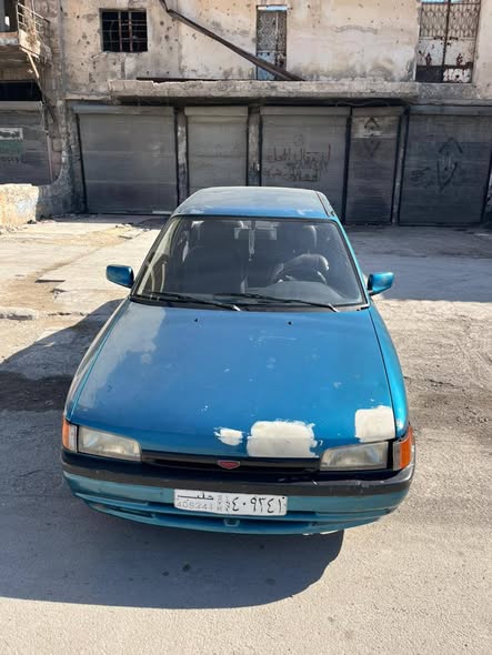 مازدا 323 1992 - صورة 1