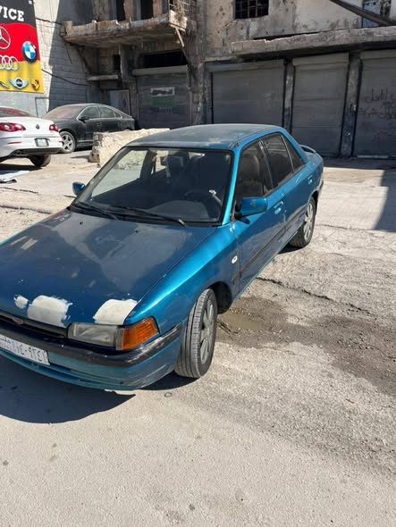 مازدا 323 1992 - صورة 2