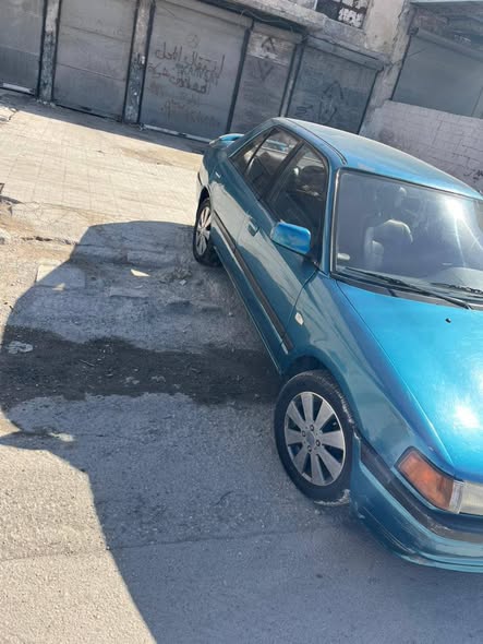 مازدا 323 1992 - صورة 3