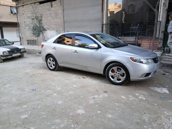 كيا فورتي 2010 - صورة 2