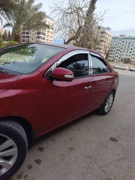 كيا فورتي 2010 - صورة 2