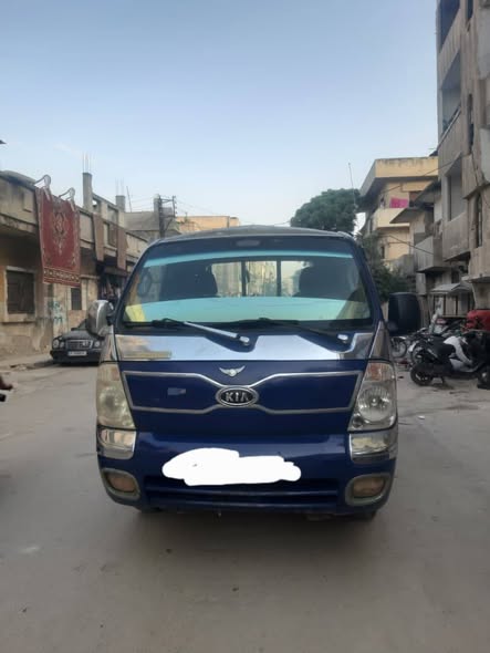 كيا بانغو 2004 - صورة 1