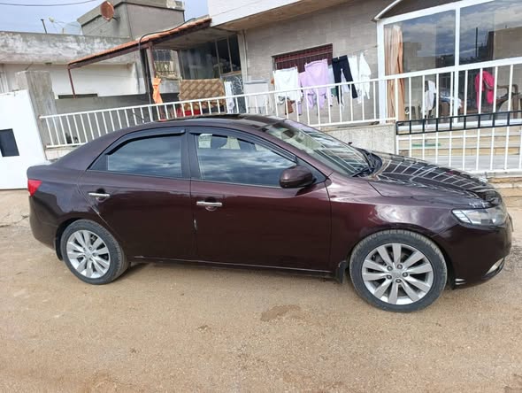 كيا فورتي 2011 - صورة 1