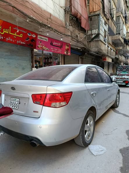 كيا فورتي 2011 - صورة 4