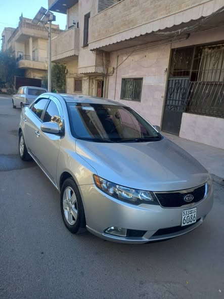 كيا فورتي 2011 - صورة 2