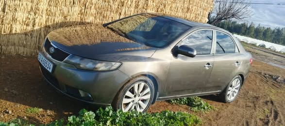 كيا فورتي 2009 - صورة 1