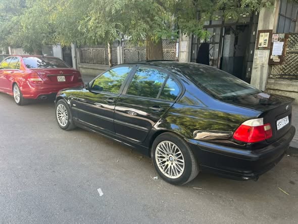 بي إم دبليو 318 2002 - صورة 2