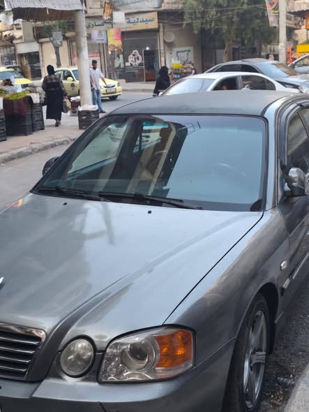 كيا كيا سيراتو 2001 - صورة 4