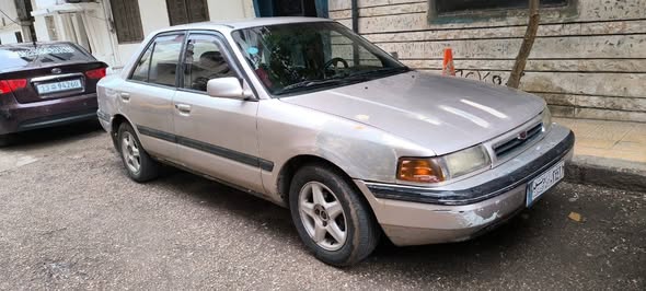 مازدا 323 1993 - صورة 2