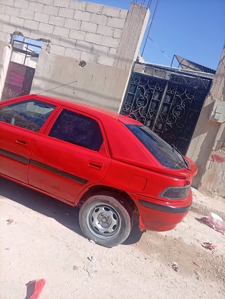 مازدا 323 1991 - صورة 2