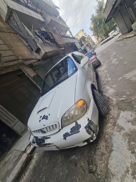 كيا كرنفال 2002