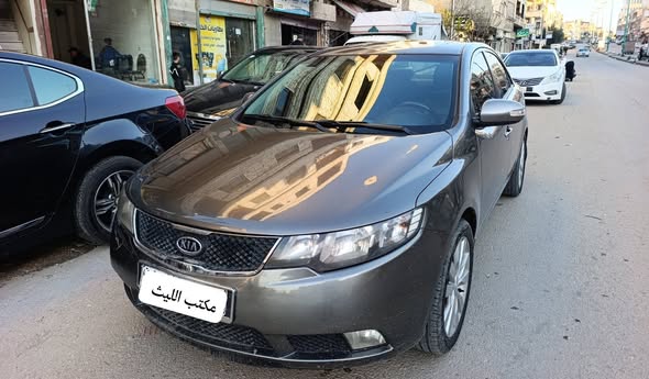كيا فورتي 2011 - صورة 2