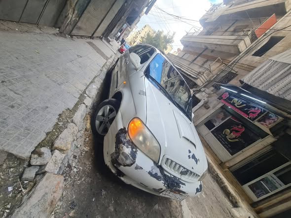 كيا كرنفال 2002