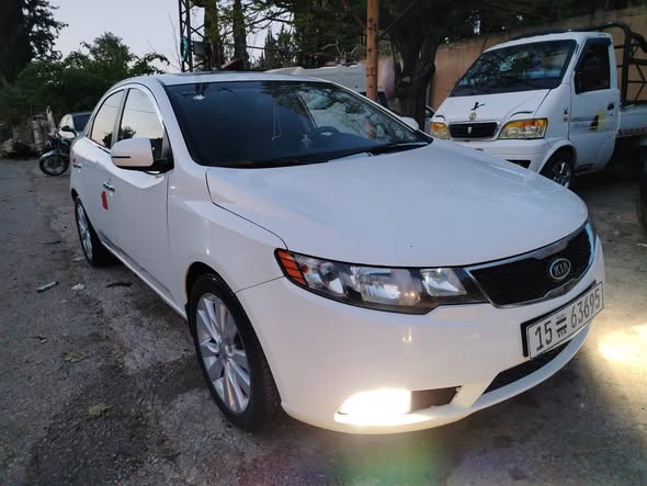 كيا فورتي 2011 - صورة 3