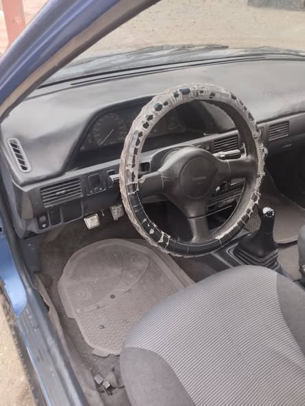 مازدا 323 1993 - صورة 2