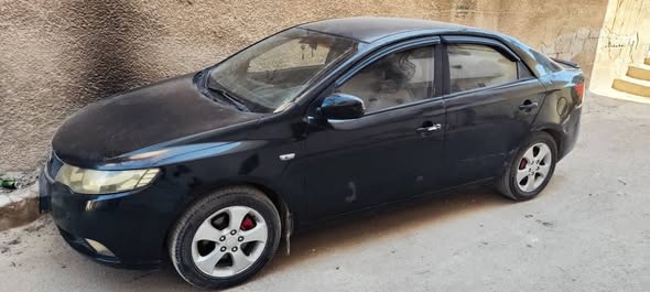 كيا فورتي 2010 - صورة 2