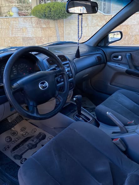 مازدا 323 2004 - صورة 4