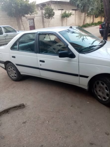 بيجو روى 2005 - صورة 3