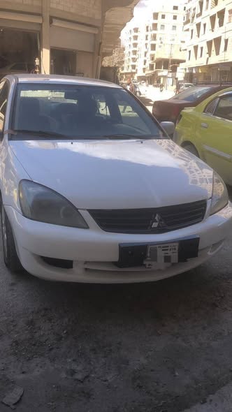 ميتسوبيشي لانسر 2014 - صورة 3