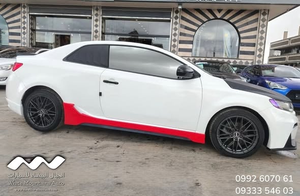 كيا فورتي 2011 - صورة 2